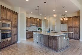 Welcome Guests Into Your Kitchen With Inviting Tahoe Ash Cabinets From Our Value Series Ash Kitchen Cabinets Custom Kitchen Cabinets Modern Farmhouse Kitchens