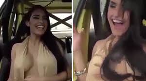 Busty babe laughs as boobs fly out of top during extremely bumpy ride in  rally car - Daily Star