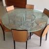 For a sleek, modern appearance, try a glass top dining room set with a clear pane resting on a metal base. 1