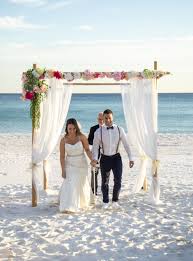 Put A Pop Of Color On Your Wedding Arch That Makes Everyone Smile Beach Wedding Packages Bamboo Wedding Arch Wedding Arch