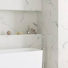 Marble has forever been the material selected to reflect quality and luxury. Polaris Satin White Marble Rectified Tile 30x90cm Brooke Ceramics
