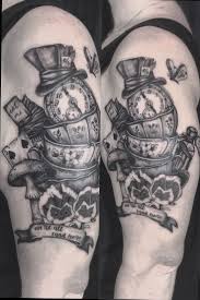 Something that i love about these tattoos are the colors, since normally although darker colors tend to stand out due to the history. Alice In Wonderland Half Sleeve Black Grey Sleeve Tattoos Wonderland Tattoo Disney Sleeve Tattoos