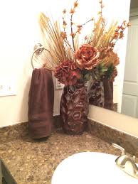Tall silk flower arrangements are striking when placed on buffets, formal entryways and corner tables with the advantage of incorporating realistic blooms, everlasting. Brown Bathroom Floral Arrangement Bathroom Feature Wall Classic Powder Room Bathroom Colors Brown