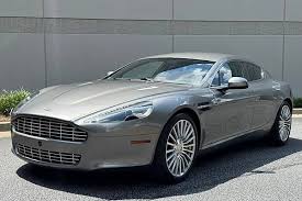 Image result for Lightning Silver 2011 Aston Martin