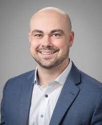 Ernest Larry Champion, Insurance Broker