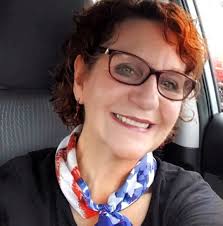 Beautiful red rose trellis at Broadway at the Beach...