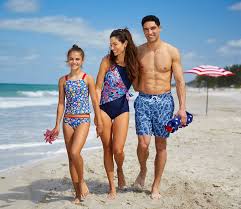 Happy young people jumping on the beach. Bealls Florida Make It A Red White Blue Family Beach Facebook
