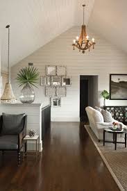 The White Painted White Tongue And Groove Wood Paneled Walls And Ceiling Lend A Casual Yet Sophisticated Backdrop Description From Family Room Home Decor Home