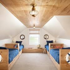 We will eventually put some sort of pull out closet where that little tree/stump vignette is, but for now they don't need one. Kids Attic Bedroom Houzz
