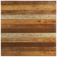 The Canadia Ceramic Wood Look Tile In Brown Tan Is Great For Many Style Decors This Tile Mimics Hardwood In Varying Shades Flooring Ceramic Floor Merola Tile