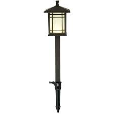 For a bit of a nighttime glow, check out these wire solar path lights. Hampton Bay Low Voltage Bronze Outdoor Integrated Led Mission Style Landscape Path Light With Frosted Glass Lens 29607 The Home Depot