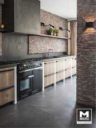 keuken met betonstuc en steense wand molitli interieurmakers industriele keukens homify keuken idee keuken ontwerp keuken ideeen