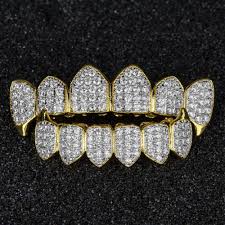 We offer real diamond grillz made from solid gold in your choice of color. Simulated Diamond Grillz 18k Gold Plated Luxury For Only 46 99