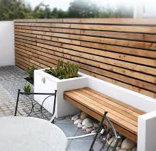 I also love this because you can change up the containers each season to add a little different look to your backyard. Horizontal Fence Panels Modern Garden Fence Design Ideas