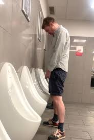 HANDSOME DADDY AT THE FOOTBALL GAME URINALS - ThisVid.com