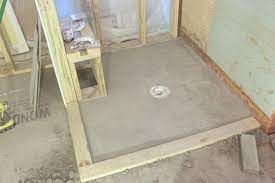 This video shares how to tile a shower pan. How To Diy A Shower Pan The Space Between Diy Shower Pan Shower Pan Shower Remodel