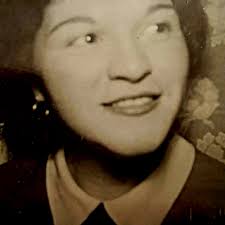 My Mom when she was young Can you colorize her , Auburn hair , light brown  eyes