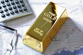 Gold Bullion Barr On A Stocks And Shares Chart Stock Photo