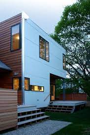 Cement boards are sold in mostly horizontal boards, however cement board sheets can be purchased for a varying siding look. Beach House Exterior Modern House Exterior House Exterior