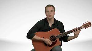 How you hold the guitar matters. How To Hold An Acoustic Guitar Guitar Lessons Youtube