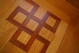 Santos Mahogany Is A Dark Reddish Brown Wood With Moderate Color Variation Installed By Through The Woods Fine Mahogany Flooring House Flooring Brown Wood