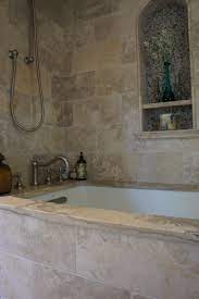 Tumbled slate and tile bathroom. Tumbled Jerusalem Limestone In This Gorgeous Shower Pebbles In Niche Tile Bathroom Bathrooms Remodel Amazing Bathrooms