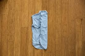 How To Pack A Dress Shirt In A Suitcase Or Carry On Shirt Dress Khaki Suits Shirt Folding
