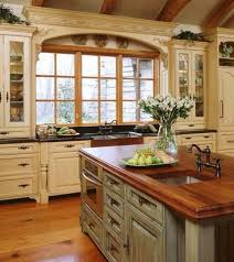 Cream Cabinets Light Blue Island And Wood Counter Tops Country Kitchen Farmhouse Country Style Kitchen Farmhouse Kitchen Design