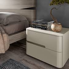 When choosing bedside tables, the main idea is to match it with the rest of the furniture in the bedroom. Curved Bedside Table
