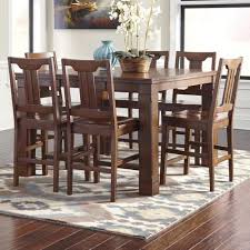 Ashley Furniture Matching Casual Elegance And Function This Counter Height Table With A Butterfly Leaf Creates A Welcoming Dining Area Constructed O Furniture