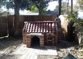 this luxury dog house is built out of brick it s quite funny that little dog house will last longer luxury dog house diy outside dog house luxury dog kennels