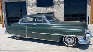Image result for Bolero Maroon 1951 Cadillac