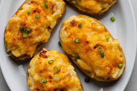Turn Ordinary Spuds Into Savory And Satisfying Baked Stuffed Potatoes Recipe Potato Recipes Recipes Yummy Side Dish