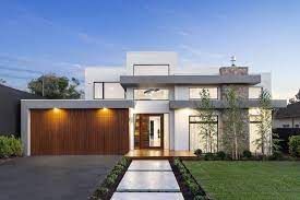 A Modern Sleek Facade Featuring Hebel Stone Feature Cedar Garage Door Combined With A Ov House Design Small House Design Australia Cottage House Designs