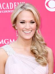 She pulls hair away from the face using a braid descending down the side, connecting loose strands and bringing the look together magnificently. Easy And Elegant Homecoming Hairstyles Hairstyles Weekly