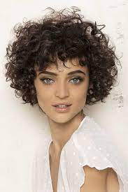 Attractive Young Lady Tanned Skin Short Haircuts Curly Hair Gray Eye Color Large Volume Me Curly Hair Styles Short Curly Hairstyles For Women Short Hair Styles