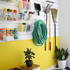 The steel shelves are perfect for paint cans. Diy Garage Organization Ideas