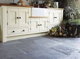 Soapstone countertops can handle the biggest kitchen messes while maintinaing their timeless beauty. Flagstone Flooring This Is From Uk Where In Us English Cottage Kitchens Cottage Kitchen Cabinets Kitchen Flooring