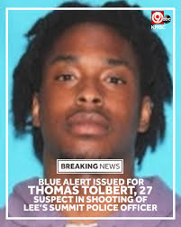 Imminent and credible threat" A rare Blue Alert has been issued for  27-year-old Thomas Tolbert in connection with the overnight shooting of a  Lee's Summit, Missouri, police officer. Here's what we know:
