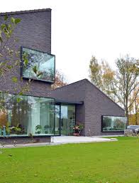 Architektuurburo Dirk Hulpia Completes House In Belgium With Protruding Corner Windows Modern Brick House Brick Architecture Facade House