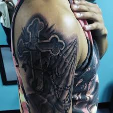 Praying person's hands are one of the most common images of religious tattoos of our time. Top 63 Praying Hands Tattoo Ideas 2021 Inspiration Guide