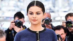 Her tattoo is just below the elbow on her right arm, but each of the pals put their tattoo in a different place. Selena Gomez S Neck Tattoo She Shows Off New Rare Ink Hollywood Life