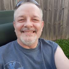 Who can mow hills with a rider and what is the charge?