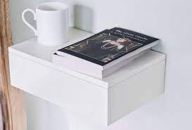 It's made from solid oak with wood grain variation for a rustic, natural look. 10 Easy Pieces Wall Mounted Bedside Shelves With Drawers The Organized Home