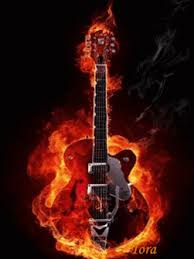 Man playing guitar against fire background. Animated Fire Guitar Pda Wallpapers Gif Gfycat
