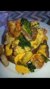 Shrimp Steak Broccoli And Cheese Loaded Potato Steak And Baked Potato Unhealthy Food Food Recipies