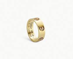 5 Iconic Jewellery Pieces That Will Never Go Out Of Fashion Cartier Love Ring Love Ring Dainty Diamond Wedding Bands