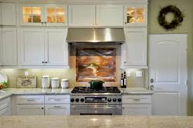 The appliance has to plug in somewhere, and wires hanging above a stove are both dangerous and. Rolling Waves Painting Above Stove Brings Beachy Feel To Kitchen Design Hgtv