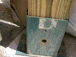 How To Attach A Wooden Railing To A Concrete Porch Hunker Concrete Porch Wooden Railing Patio Railing