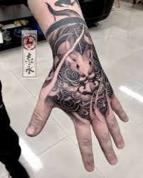Black And Grey Foo Dog Hand Tattoo Pin On Yaponske Mistectvo
